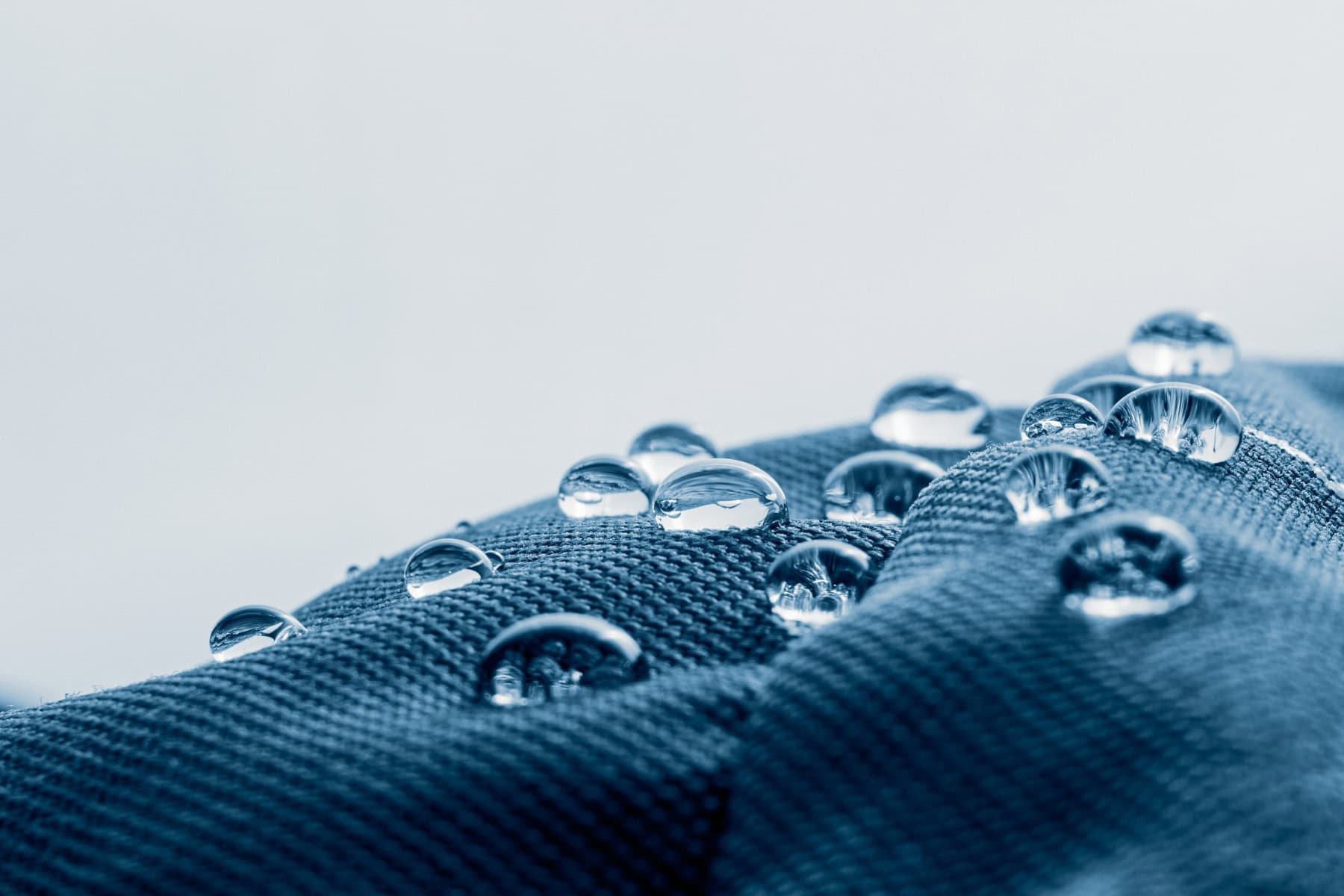 Blue Fabric with water droplets